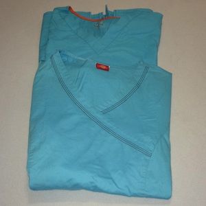 Two turquoise scrub tops